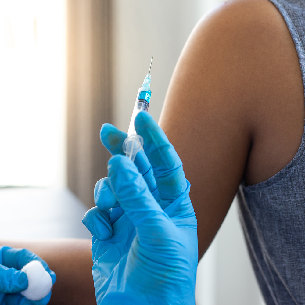 calgary pharmacist with a needle