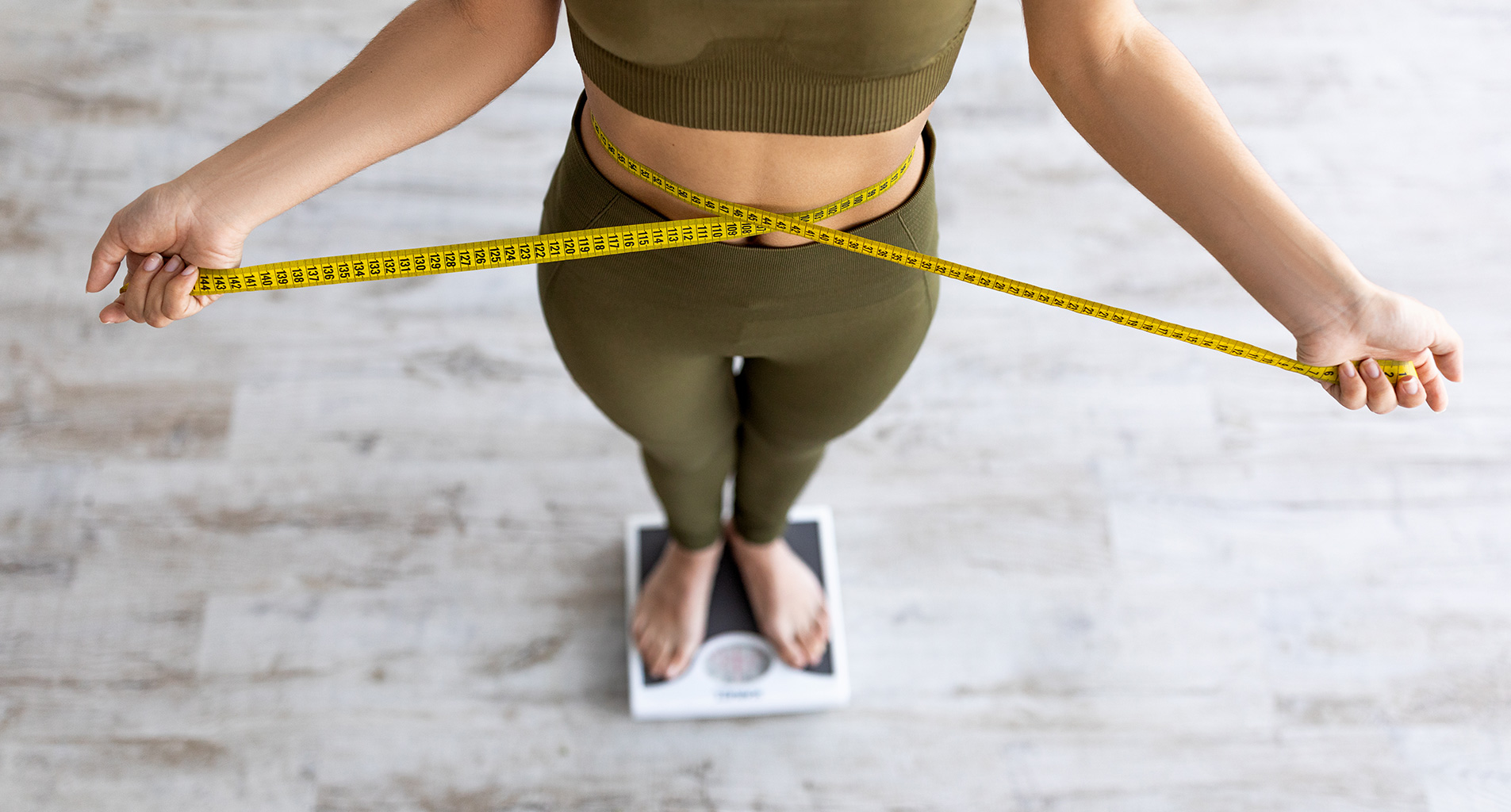 woman weighing herself